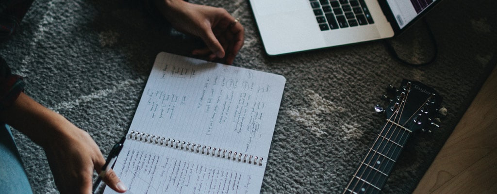 Music teacher planning music lessons.